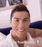 a man is smiling with the words bro did a huelbomb behind him
