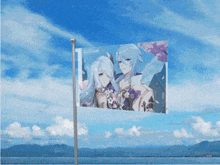 a flag with a picture of a person on it is flying in the wind