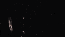 a spaceship is flying through a galaxy in the night sky .