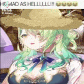 a girl with green hair is wearing a straw hat and a bow .