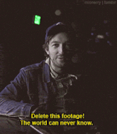 a man in a blue hat says delete this footage the world can never know