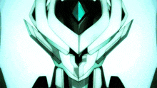 a close up of a robot 's face with a blue diamond in the center