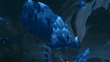 a close up of a monster 's claws in the dark