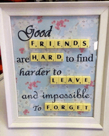a framed poster that says good friends are hard to find harder to leave impossible to forget