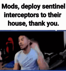 a man is sitting in front of a computer with the words mods deploy sentinel interceptors to their house