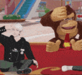 a man and a monkey are sitting on a red rug