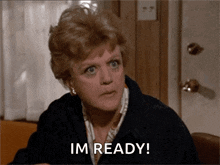 a woman says i 'm ready while looking at the camera