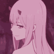 a close up of a pink anime girl with horns and long hair .