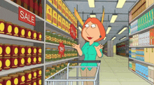 a woman is shopping in a grocery store with a sale sign above her