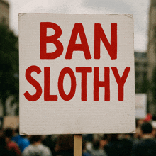 a sign that says " ban slothy " on it