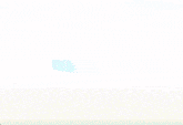 a blurry picture of a stadium with a flower on the top