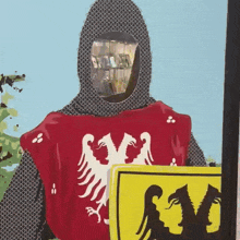 a painting of a knight holding a yellow shield with the letter m