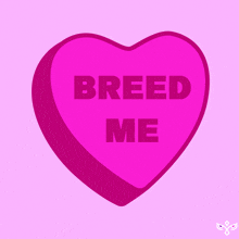 a pink heart that says " breed me " on it