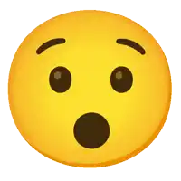 a yellow smiley face with a surprised expression on it