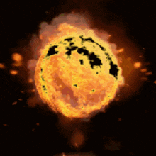 a cartoon drawing of a burning sun with a black spot on it
