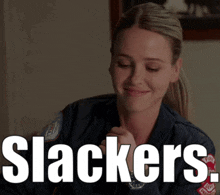 a woman is smiling with the words slackers in white letters
