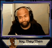 a man wearing headphones with the caption illay they / them @michaelcrits