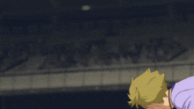 a man wearing a purple shirt that says kyokawa on it