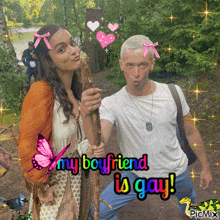 a man and a woman are posing for a picture and the caption says my boyfriend is gay