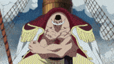 a man with a white beard and a red cape