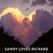 a picture of a cloud in the shape of a heart with the words sandy loves richard below it