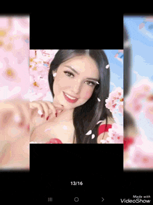 a picture of a woman with flowers behind her and the date 13/16