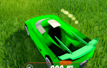 a green car is sitting in a grassy field with a speedometer reading 200 mph