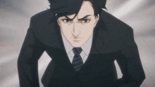 a man in a suit and tie is looking at the camera with a serious look on his face