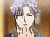 a man with purple hair is looking down with his eyes closed