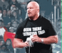 a man is wearing a black shirt that says been there destroyed that