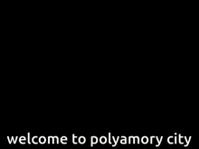 a billboard says welcome to polyamory city in front of a cityscape