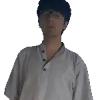 a man wearing glasses and a white shirt looks at the camera