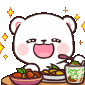 a white bear is sitting at a table with a bowl of food .