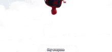 a man in a spiderman costume is holding a captain america shield over his head