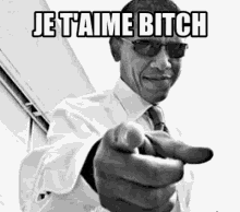 barack obama is pointing at the camera and saying `` je t'aime bitch '' .
