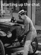 a black and white photo of a man starting up the chat