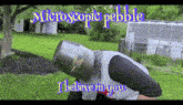 a man wearing a bucket on his head with the words microscopic pebble i believe in you above him