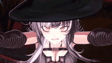 a witch with a black hat and gloves is making an angry face