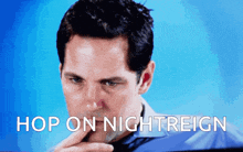 a man with his hand on his chin and the words hop on nightreign written below him