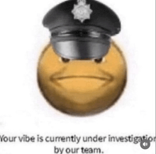 a smiley face wearing a police hat is currently under investigation by the police .