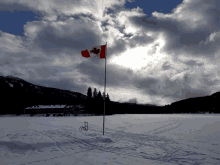 frozen lake flag canada snow