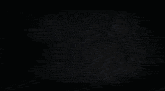 a dark background with a glowing circle in the center