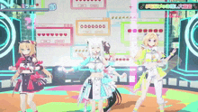 three anime girls are dancing in front of a computer screen that says 00000 on it
