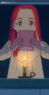 a girl with red hair is holding a book in front of a lit candle and the words deiostudios are on the bottom right