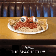 a plate of spaghetti with two eyes on top and the words i am the spaghetti