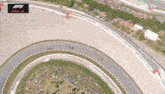 an aerial view of a race track with the words replay on the bottom right