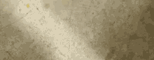 a close up of a dirty concrete surface with a yellow stain on it .