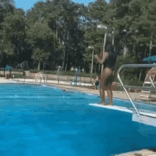Swimming Pool Wig GIF - Swimming Pool Wig Jump GIFs