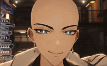 a man with a bald head and blue eyes looks at the camera