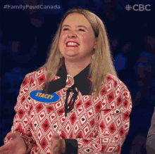 a woman with a name tag that says " stacey " on it
